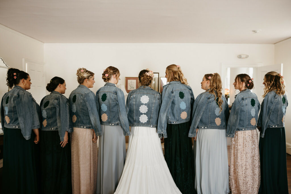 Bridesmaids with matching jean jackets.