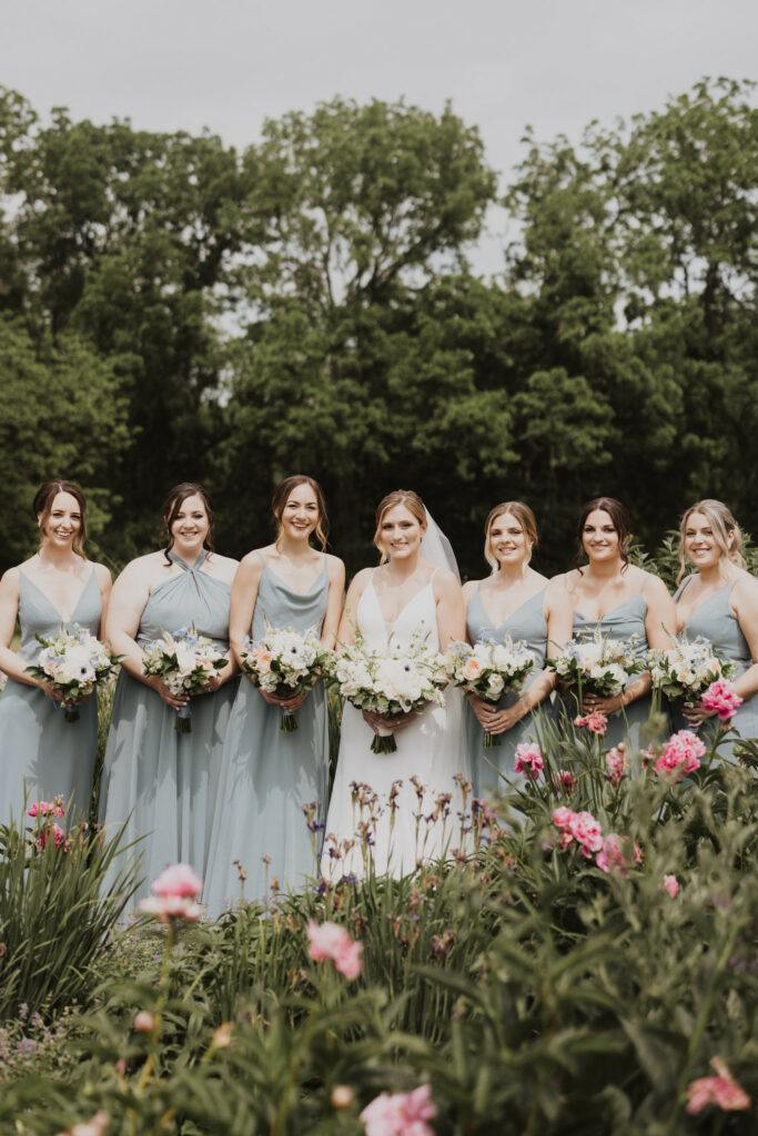 Bride and bridemaids in the garden.