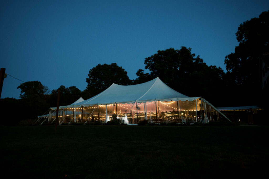 Main Tent lit up at night time at Springton Manor Farm