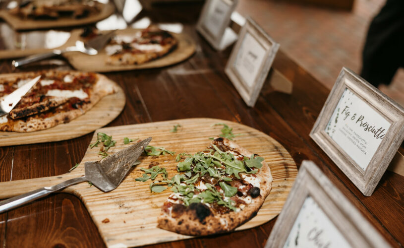 Wood fired pizzas on table