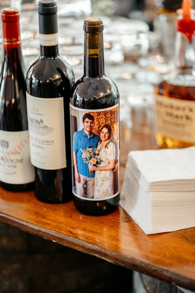 Newlyweds photo on a wine bottle.
