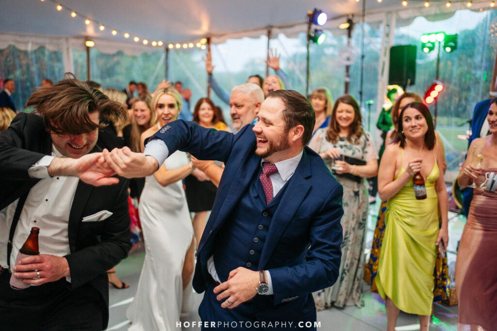 Guests dancing with the couple.