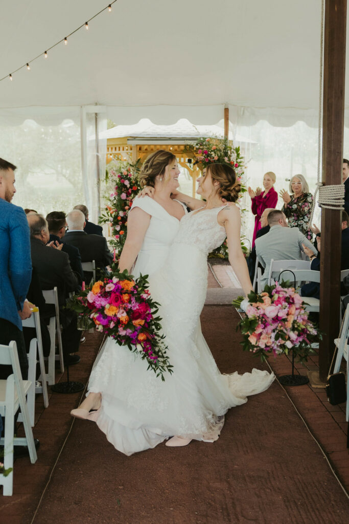 Newlyweds walking up the axle.