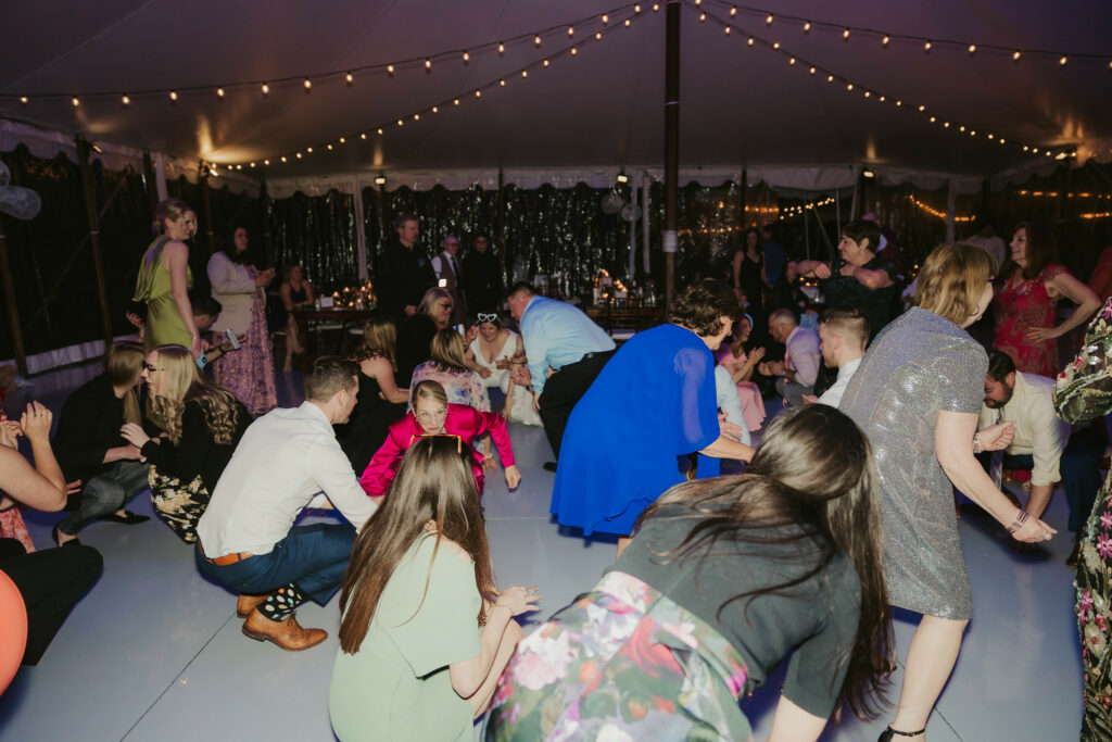 Guests dancing on the dance floor.